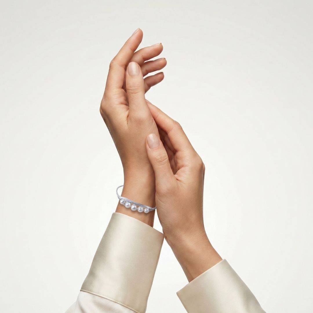 Features Five Lustrous Freshwater pearls Bracelet in White Finish