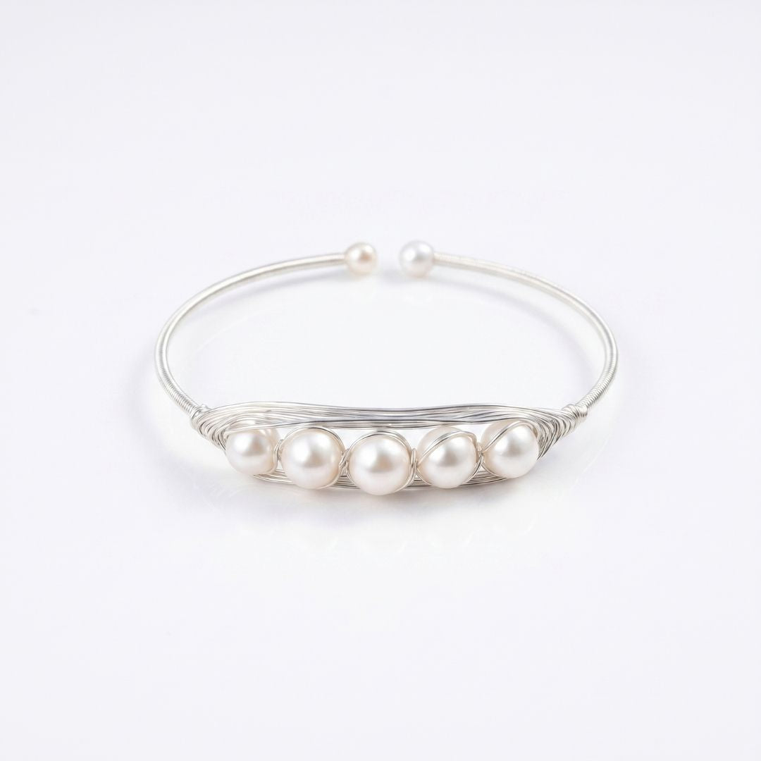 Features Five Lustrous Freshwater pearls Bracelet in White Finish