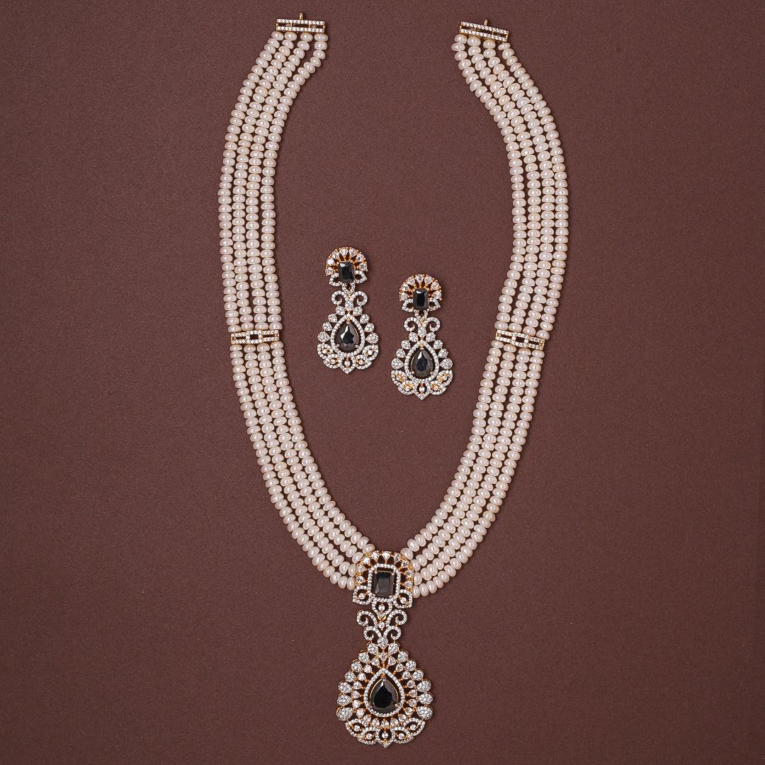 4-Layered White Freshwater Pearl Set with Blue Stone Studded Pendant