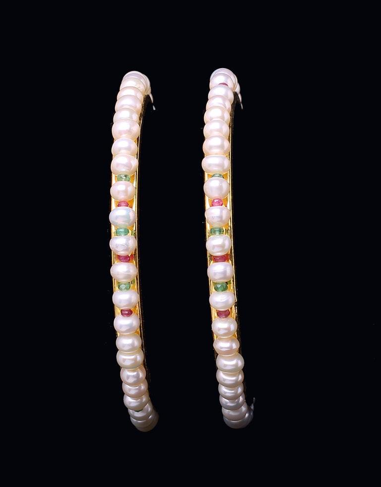Beautiful white pearl bangles beaded with luxurious Ruby and Emerald