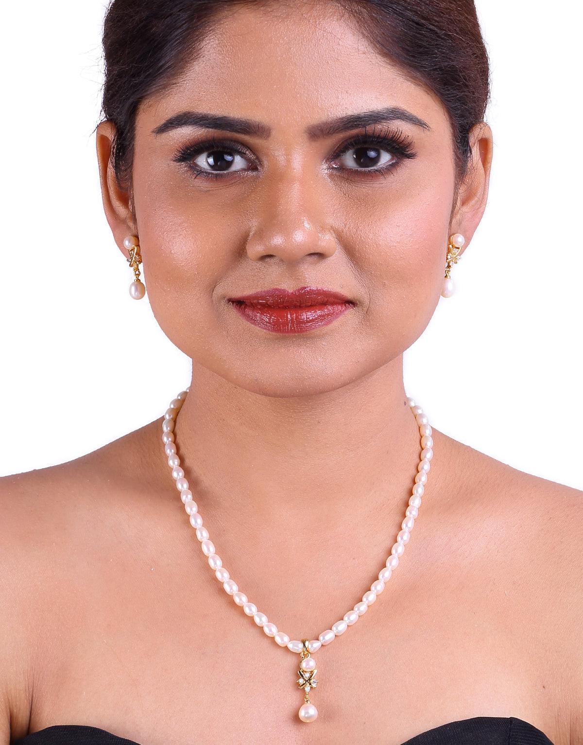 Cubic Zirconia Set In A Depicted Design, Oval Shaped Beaded Freshwater Pearl Set