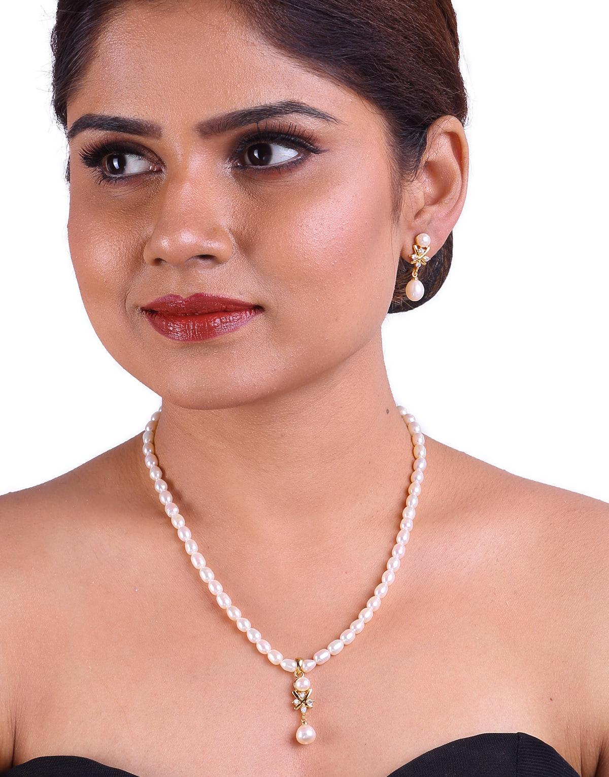 Cubic Zirconia Set In A Depicted Design, Oval Shaped Beaded Freshwater Pearl Set