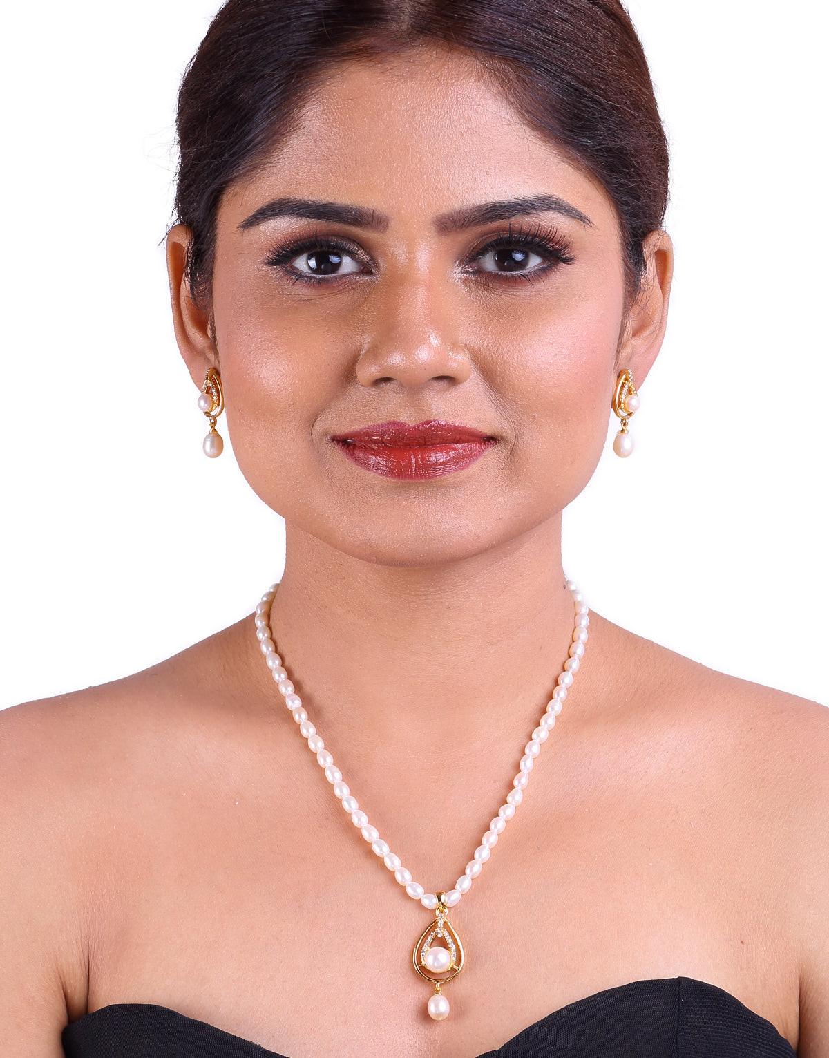 Cz Stones Set Around Round Freshwater Pearl Pendant Tangled In Beaded Pearl Necklace