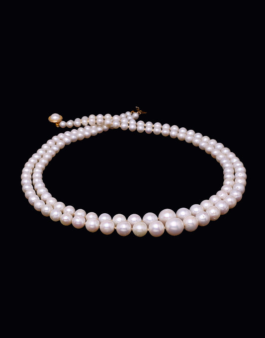 White Freshwater Pearl With Gold Cutrings