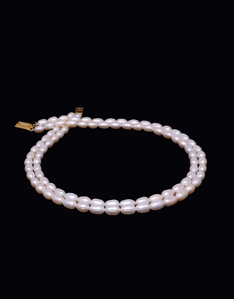 Lavish White Freshwater Oval Shape Pearl Necklace