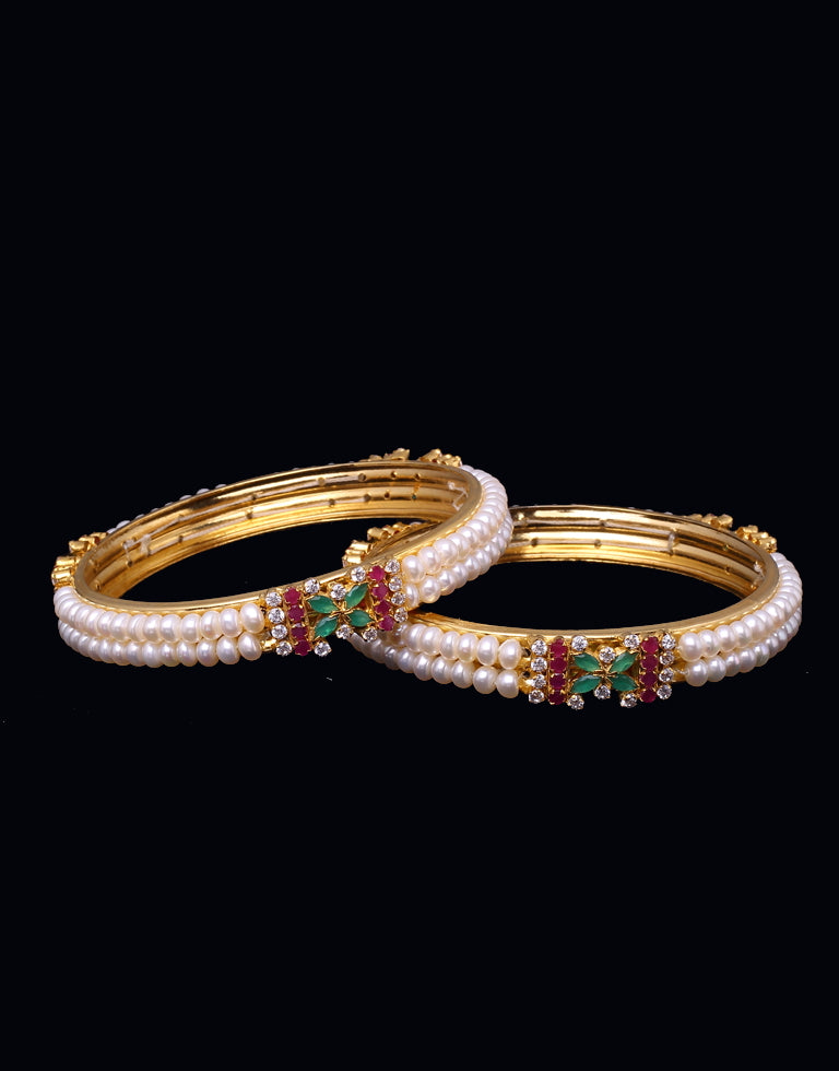 Two Line White Freshwater Pearl Bangles Studded With Semi Precious Stones