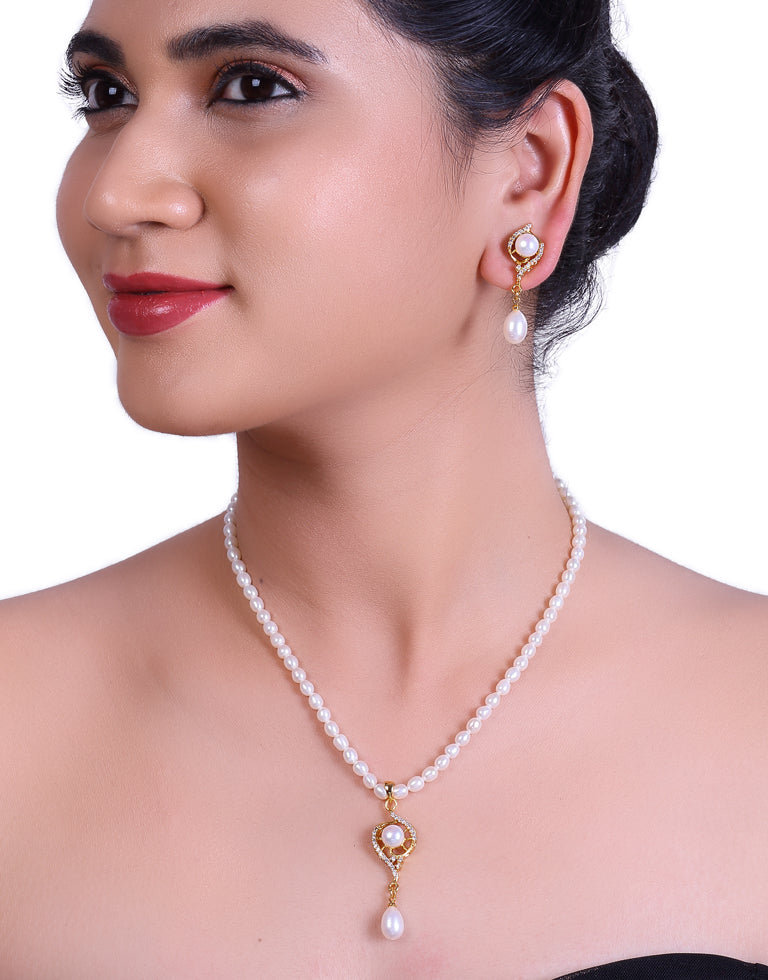 Oval Beaded Pearl Set with Stone Studded Charms And Drop Dangled Pearls