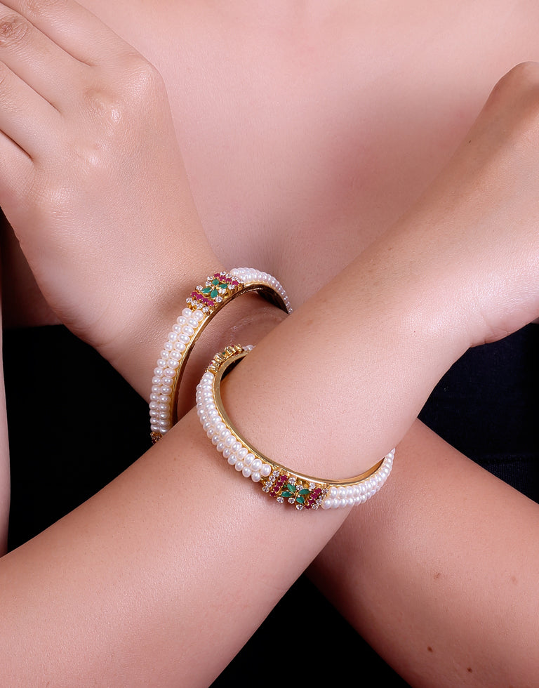 Two Line White Freshwater Pearl Bangles Studded With Semi Precious Stones