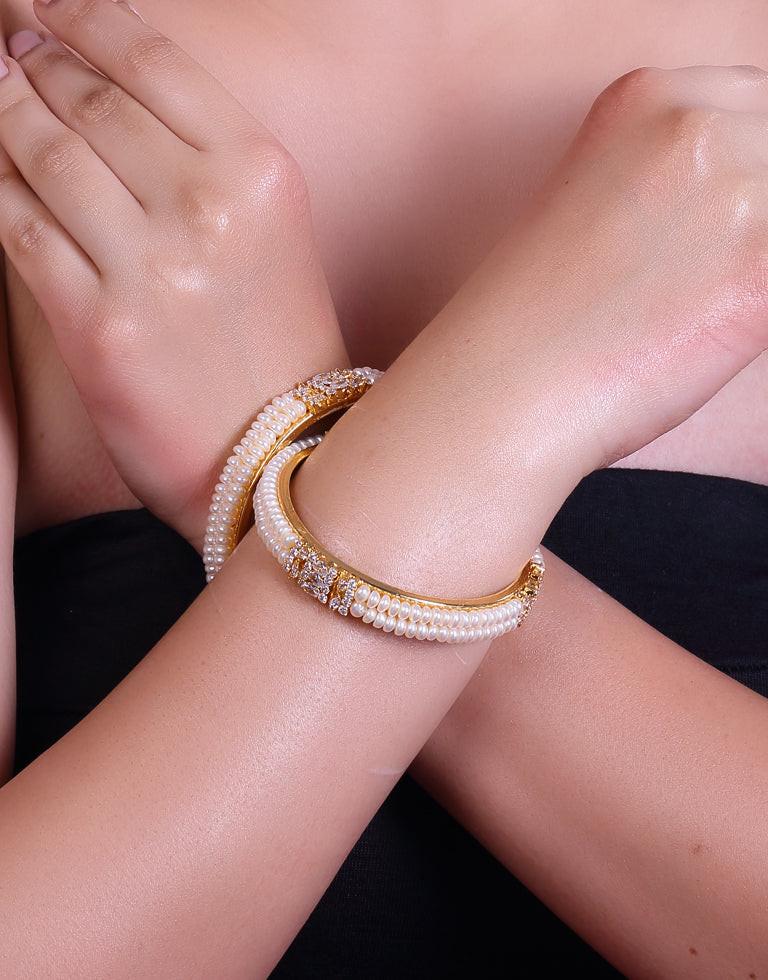 Delicately Designed Freshwater Pearl Bangles Studded With Cubic