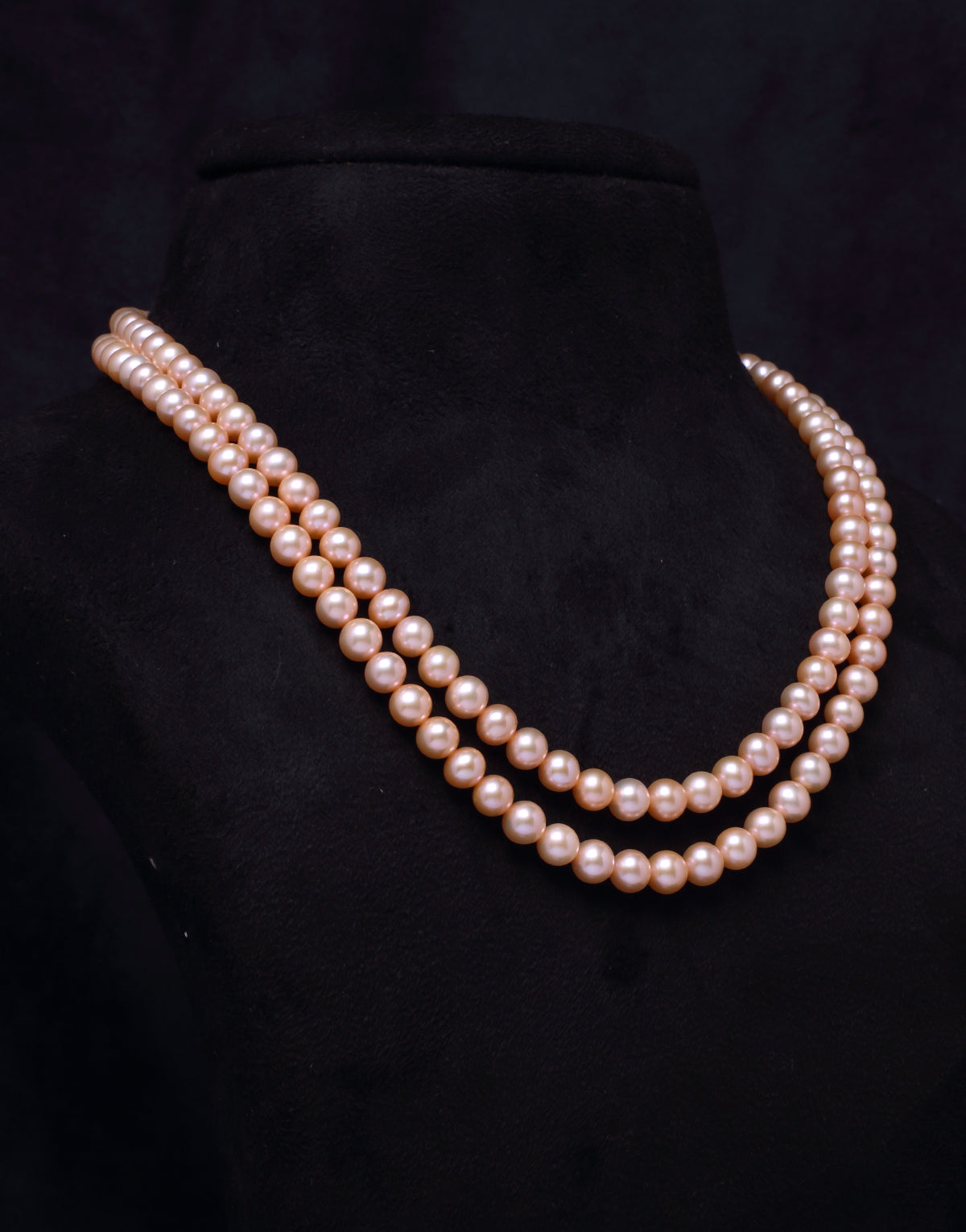 Subtle and cultured round pink freshwater pearl necklace