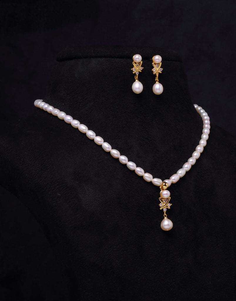 Cubic Zirconia Set In A Depicted Design, Oval Shaped Beaded Freshwater Pearl Set