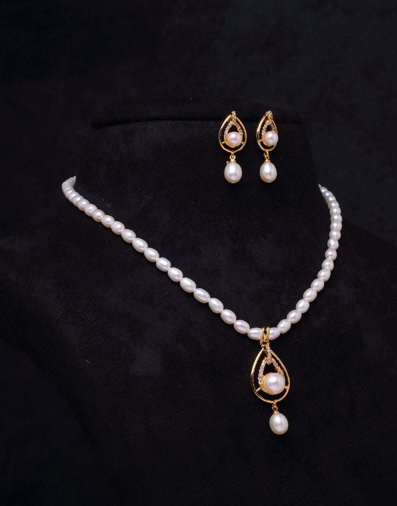 Cz Stones Set Around Round Freshwater Pearl Pendant Tangled In Beaded Pearl Necklace