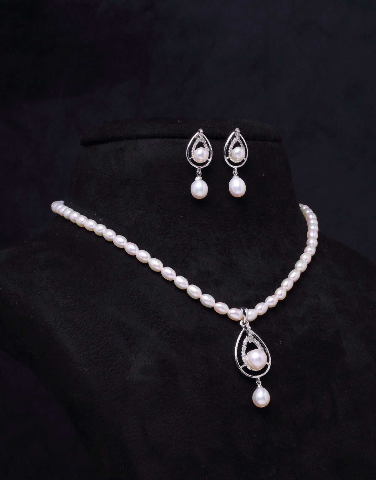 Cz Stones Set Around Round Freshwater Pearl Pendant Tangled In Beaded Pearl Necklace